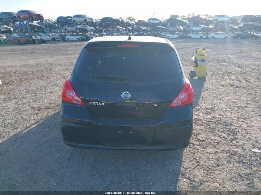 2009 Nissan Versa 1.8Sl VIN: 3N1BC13E79L411119 Lot: 42904818