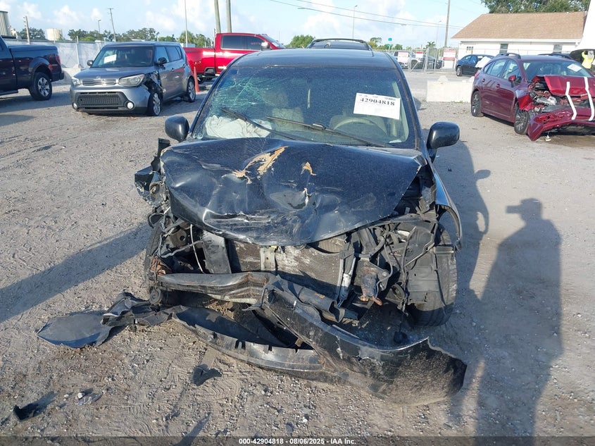 2009 Nissan Versa 1.8Sl VIN: 3N1BC13E79L411119 Lot: 42904818