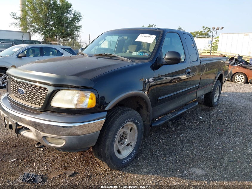 1FTRX18L62NB73261 2002 FORD F-150 photo no. 2