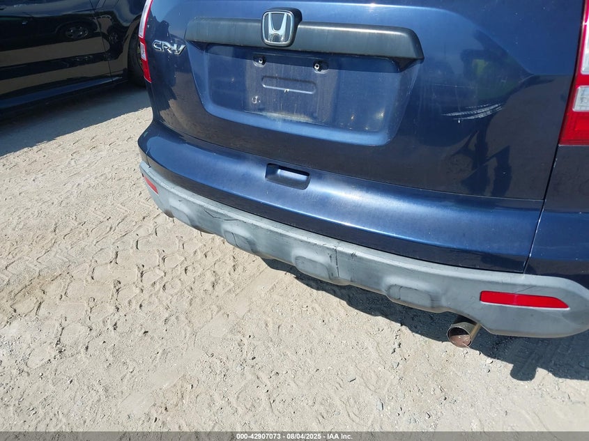 2009 Honda Cr-V Lx VIN: JHLRE48359C003389 Lot: 42907073