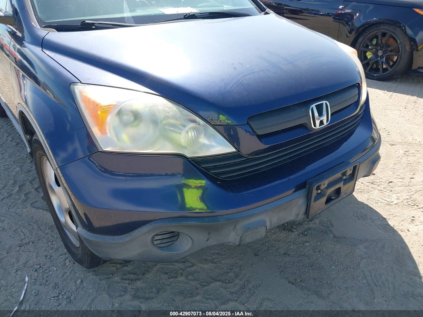 2009 Honda Cr-V Lx VIN: JHLRE48359C003389 Lot: 42907073