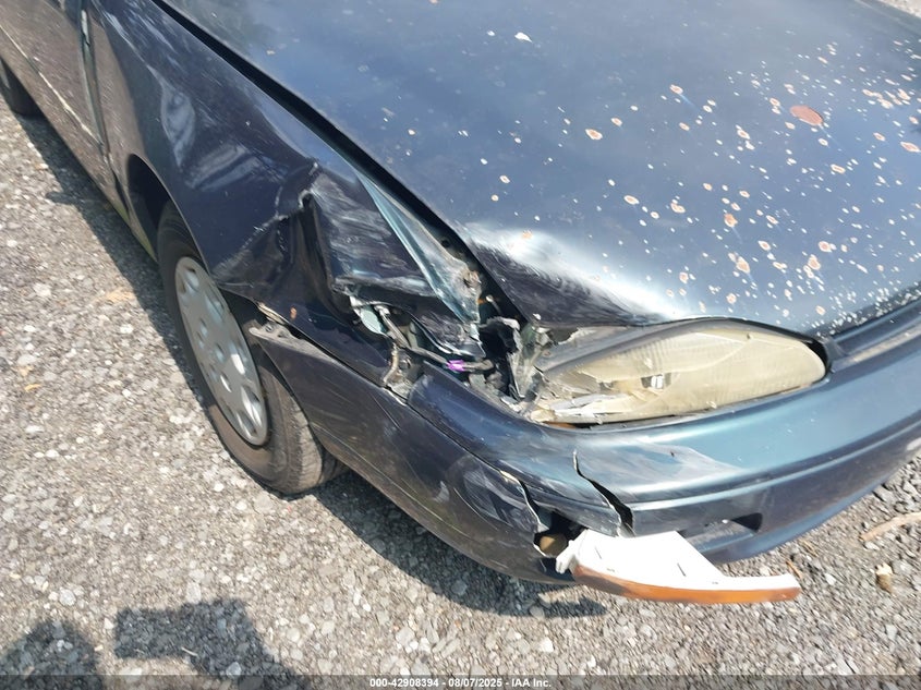 1995 Toyota Camry Le VIN: 4T1SK12E2SU872558 Lot: 42908394