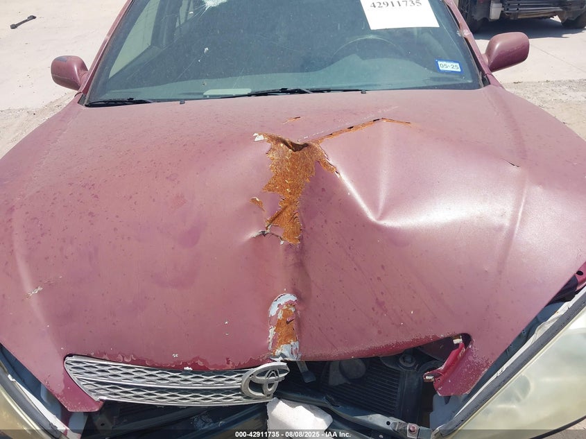 2002 Toyota Camry Le VIN: JTDBE32K320007053 Lot: 42911735