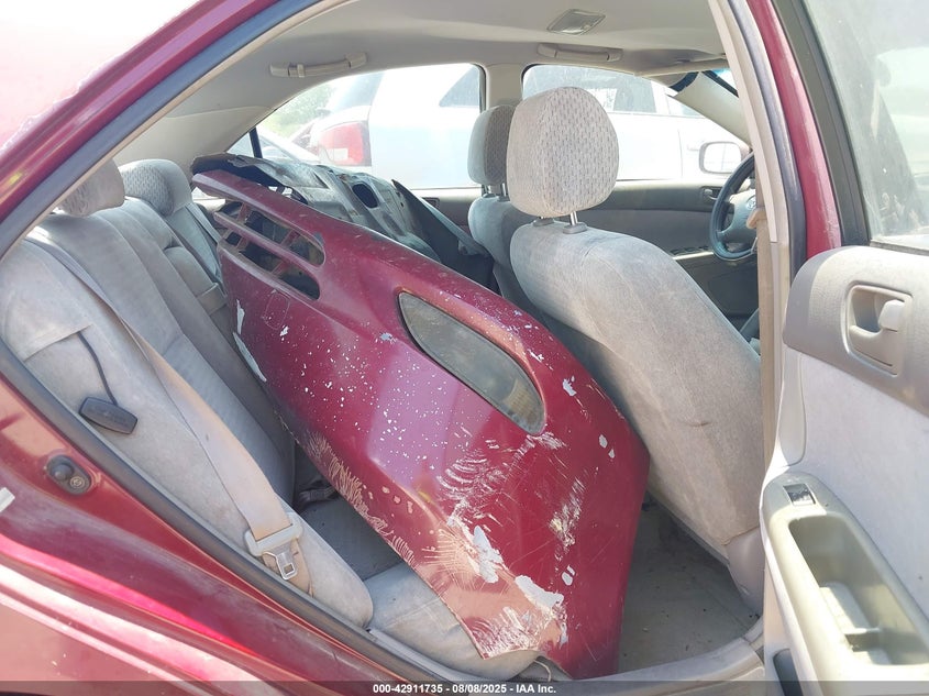 2002 Toyota Camry Le VIN: JTDBE32K320007053 Lot: 42911735