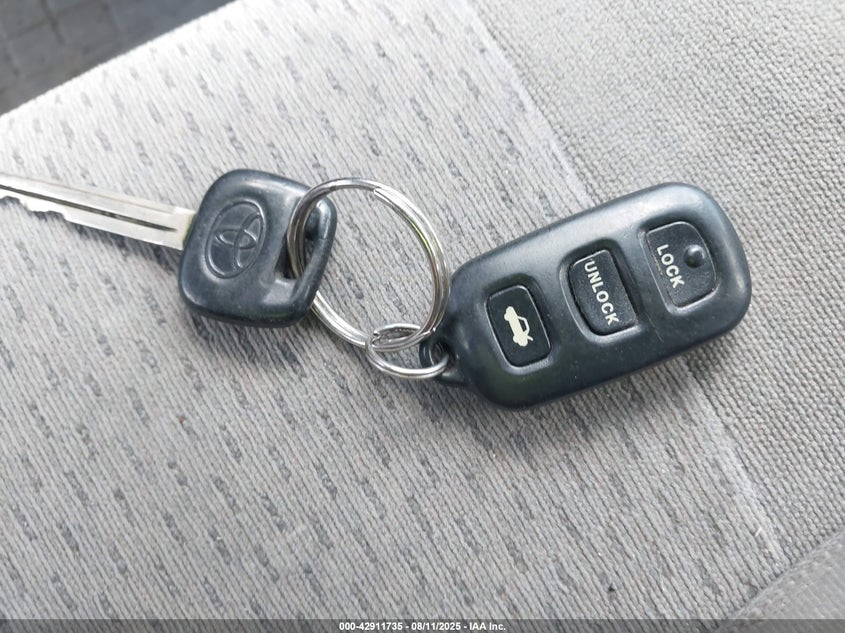 2002 Toyota Camry Le VIN: JTDBE32K320007053 Lot: 42911735