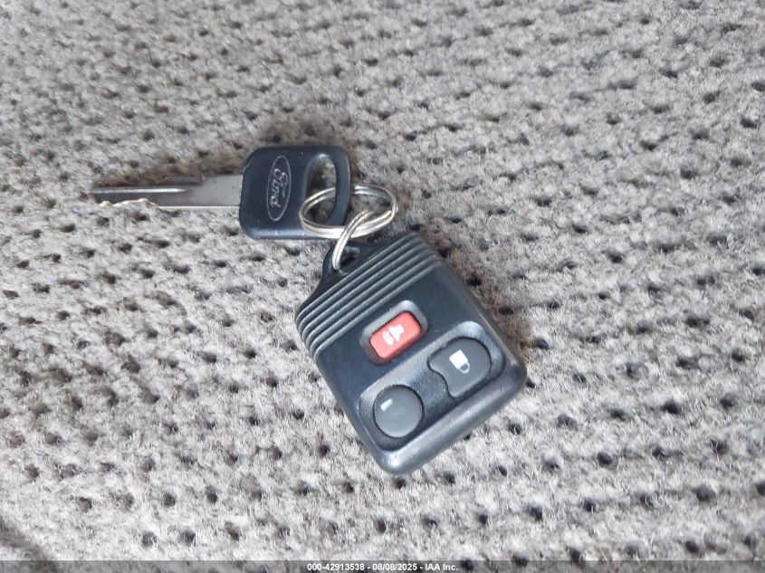 2000 Ford E-150 Recreational VIN: 1FDRE14WXYHC02124 Lot: 42913538