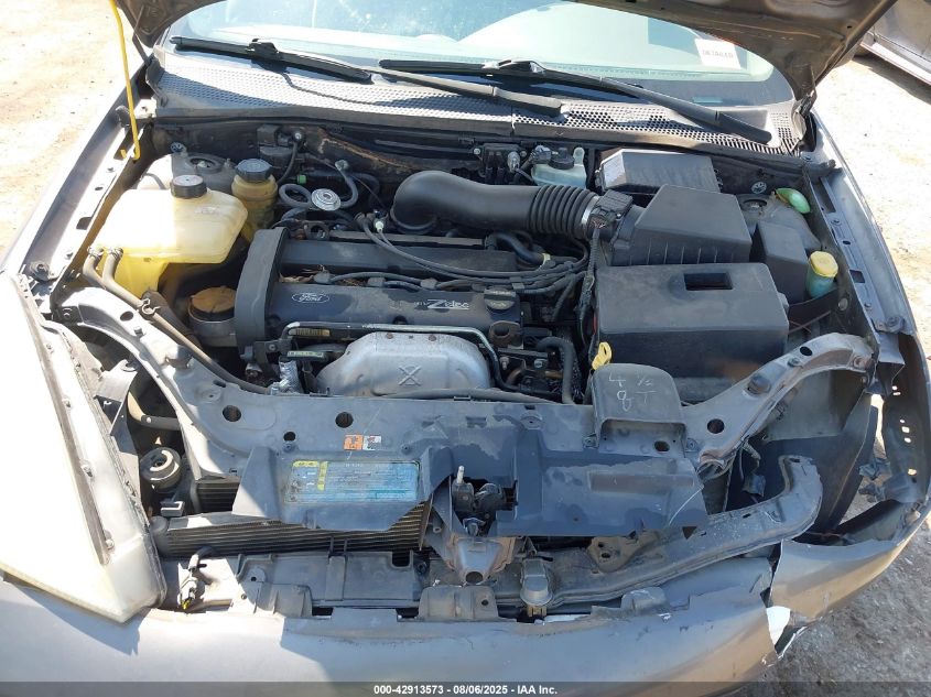 2002 Ford Focus Zx3 VIN: 3FAFP31342R140657 Lot: 42913573