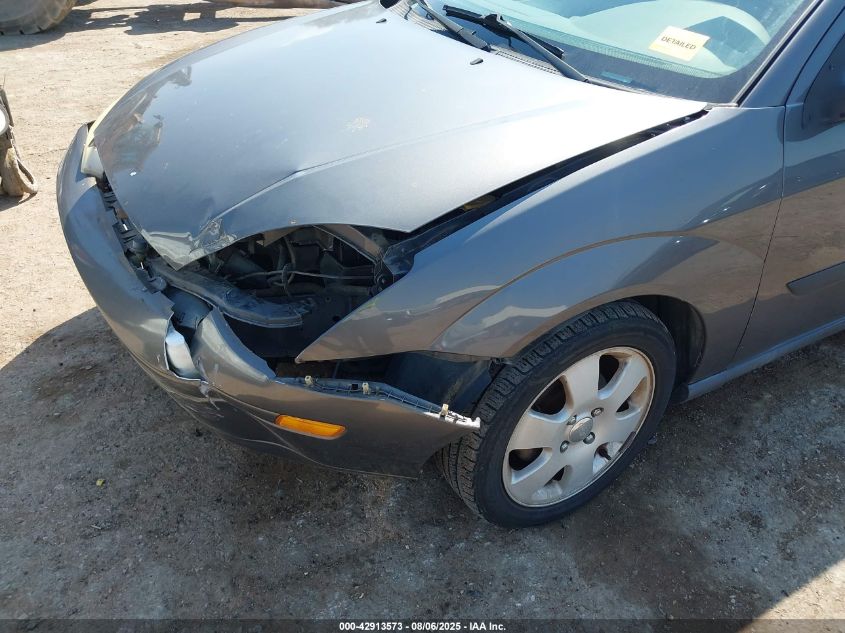 2002 Ford Focus Zx3 VIN: 3FAFP31342R140657 Lot: 42913573