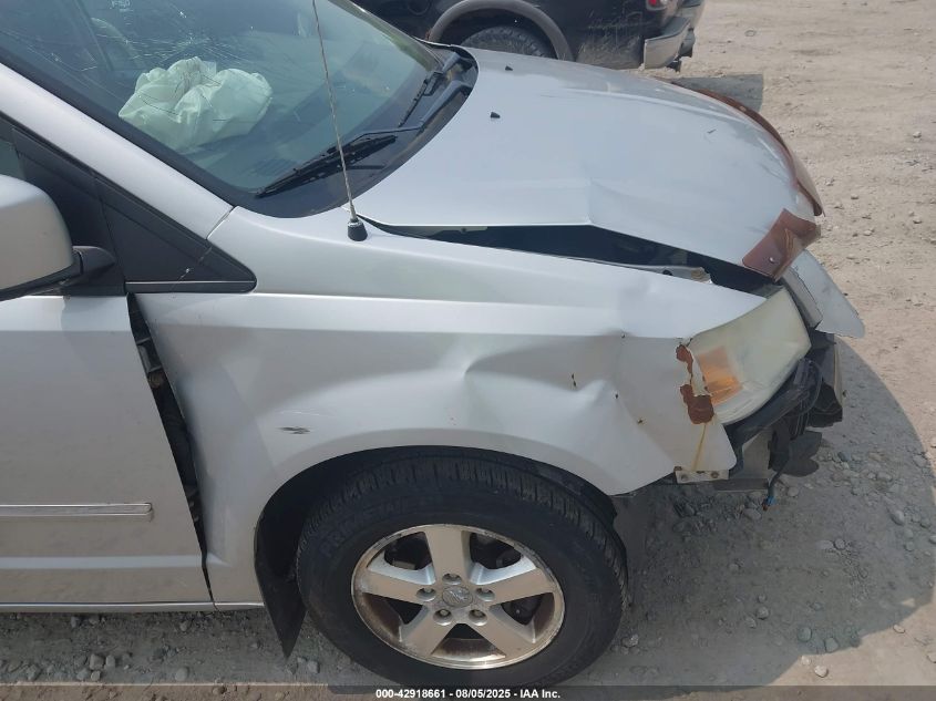 2009 Dodge Grand Caravan Sxt VIN: 2D8HN54199R539239 Lot: 42918661