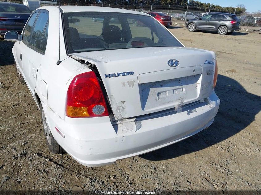 2005 Hyundai Accent Gls VIN: KMHCG45C15U612612 Lot: 42936215