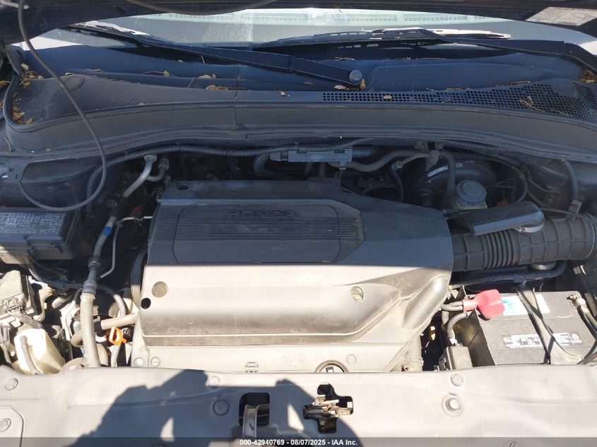 2004 Honda Pilot Lx VIN: 2HKYF18174H557971 Lot: 42940769