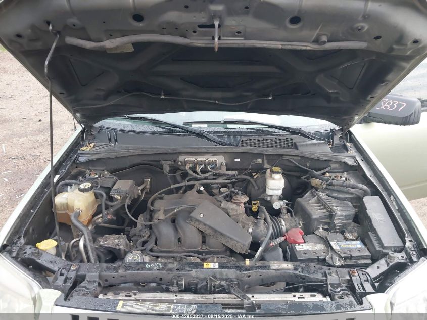 2008 Mercury Mariner V6 VIN: 4M2CU81128KJ09464 Lot: 42953837