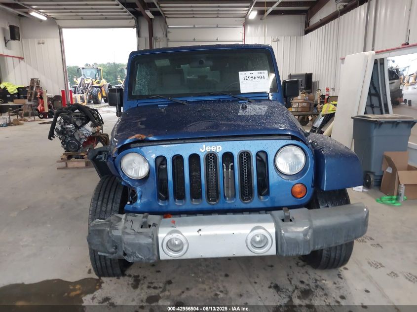 2009 Jeep Wrangler Unlimited Sahara VIN: 1J8GA59119L739063 Lot: 42956504