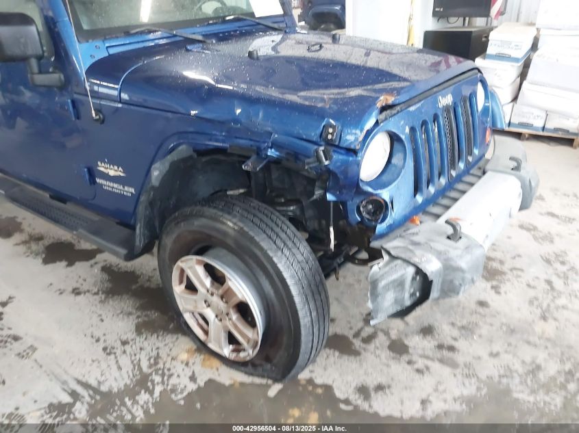 2009 Jeep Wrangler Unlimited Sahara VIN: 1J8GA59119L739063 Lot: 42956504