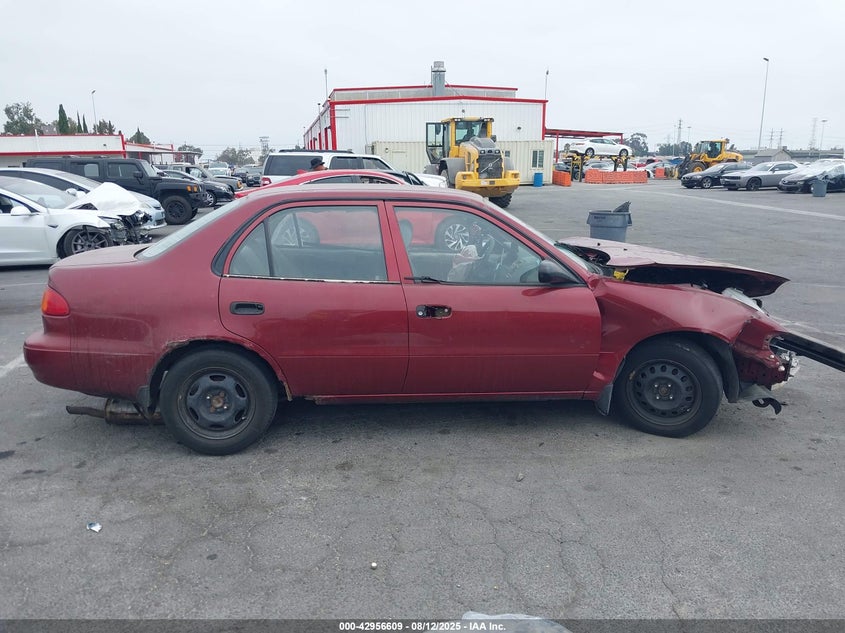 1NXBR12E9XZ243186 1999 TOYOTA COROLLA photo no. 13