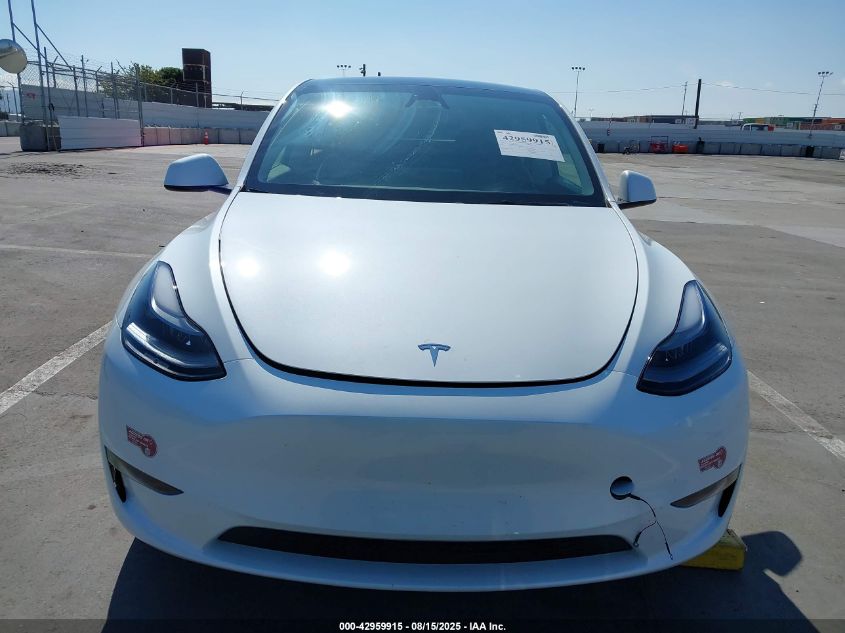 2024 Tesla Model Y Long Range Dual Motor All-Wheel Drive VIN: 7SAYGDEE4RF151287 Lot: 42959915