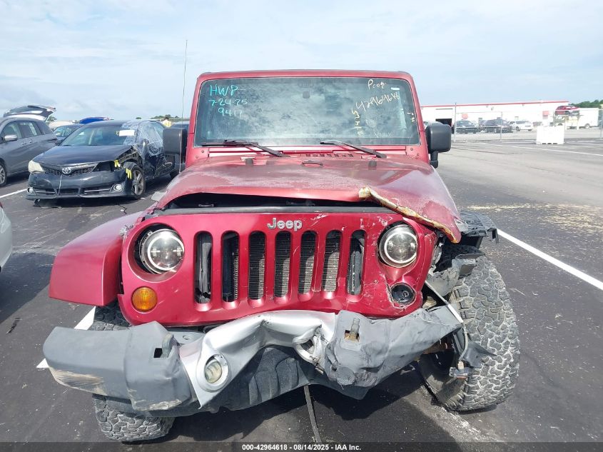 2011 Jeep Wrangler Unlimited Sahara VIN: 1J4BA5H1XBL569417 Lot: 42964618