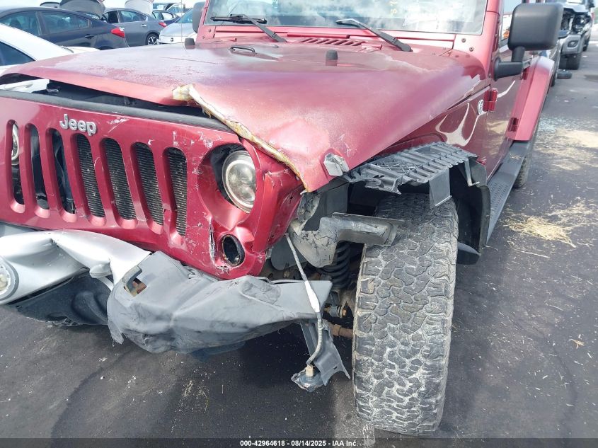 2011 Jeep Wrangler Unlimited Sahara VIN: 1J4BA5H1XBL569417 Lot: 42964618