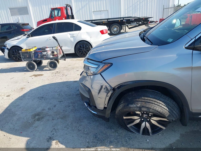 VIN 5FNYF6H69LB025675 2020 HONDA PILOT AWD TOURING 7 PASSENGER