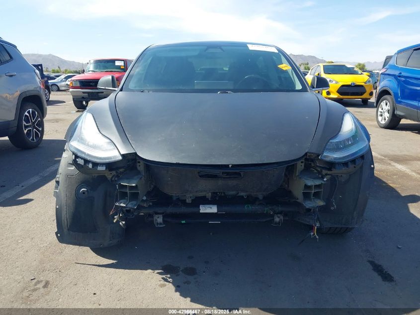 2018 Tesla Model 3 Long Range/Mid Range VIN: 5YJ3E1EA4JF021040 Lot: 42966467