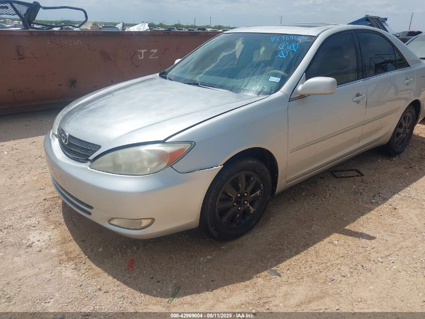 2003 Toyota Camry Xle V6 VIN: 4T1BF32K63U555261 Lot: 42969004