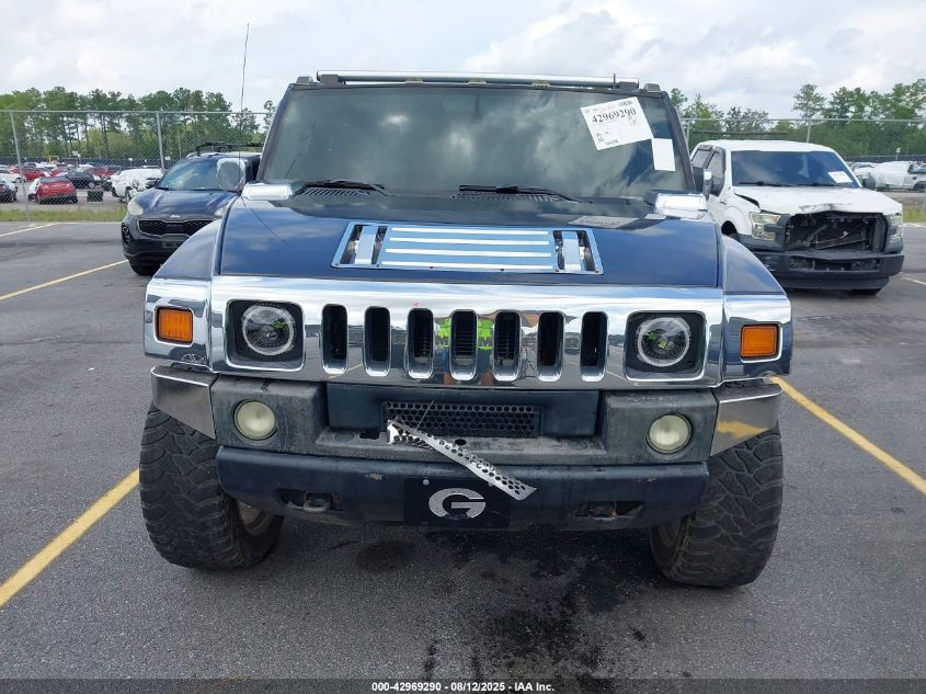 2004 Hummer H2 VIN: 5GRGN23U74M101780 Lot: 42969290