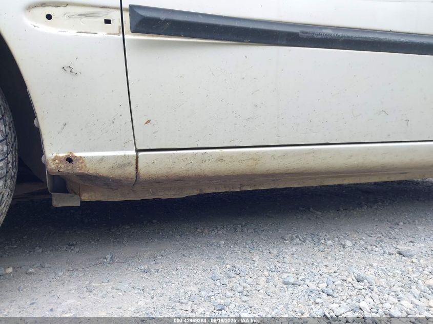 2002 Hyundai Accent L VIN: KMHCF35G12U230303 Lot: 42969384