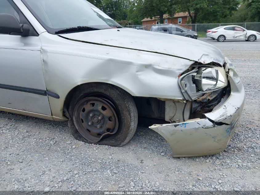 2002 Hyundai Accent L VIN: KMHCF35G12U230303 Lot: 42969384