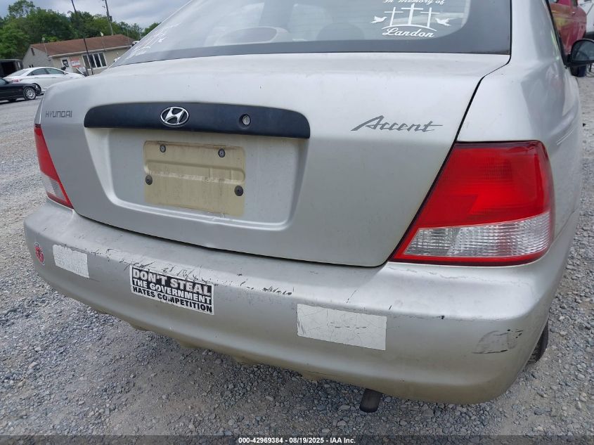 2002 Hyundai Accent L VIN: KMHCF35G12U230303 Lot: 42969384