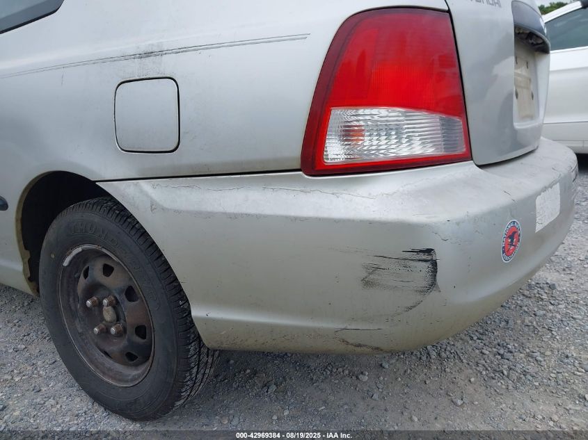 2002 Hyundai Accent L VIN: KMHCF35G12U230303 Lot: 42969384