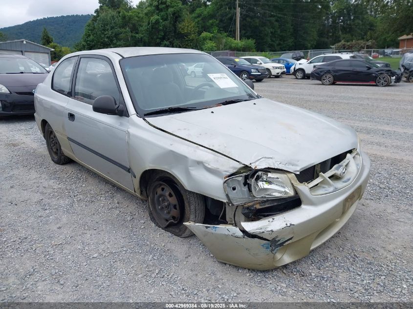 2002 Hyundai Accent L VIN: KMHCF35G12U230303 Lot: 42969384