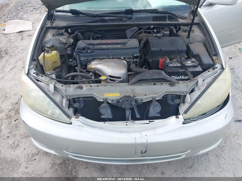 2002 Toyota Camry Le VIN: JTDBE32K320094291 Lot: 42970747