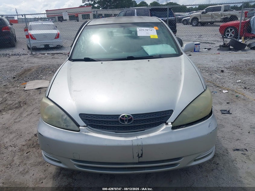 2002 Toyota Camry Le VIN: JTDBE32K320094291 Lot: 42970747