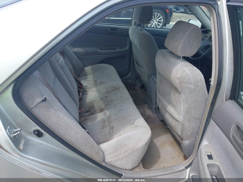 2002 Toyota Camry Le VIN: JTDBE32K320094291 Lot: 42970747