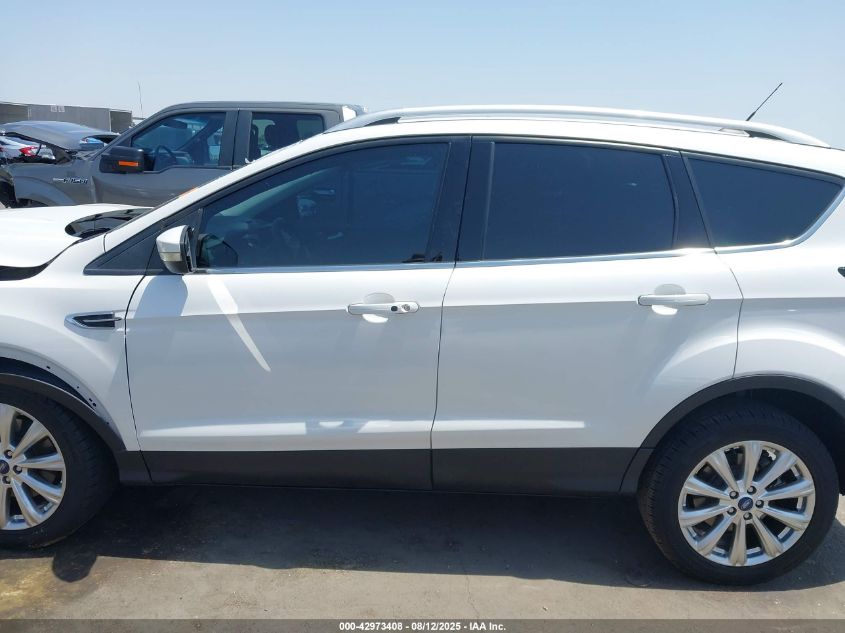 2018 Ford Escape Titanium VIN: 1FMCU0J90JUD29706 Lot: 42973408