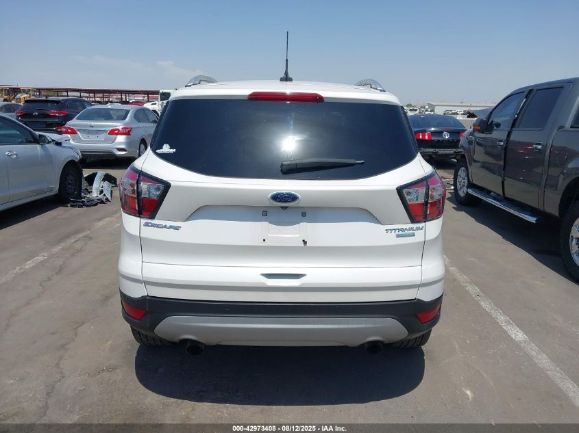 2018 Ford Escape Titanium VIN: 1FMCU0J90JUD29706 Lot: 42973408