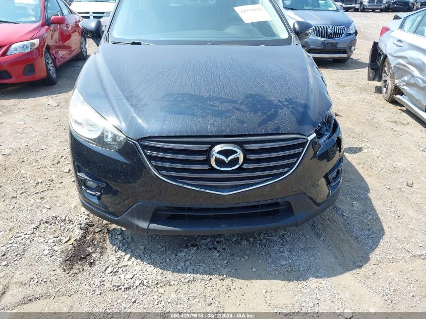 2016 Mazda Cx-5 VIN: JM3KE4DYOGO749853 Lot: 42979918