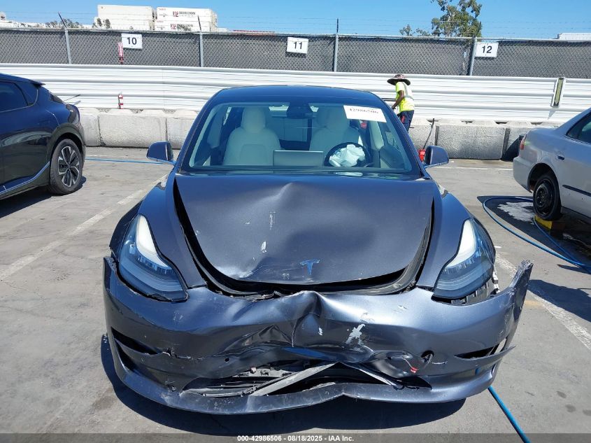 2018 Tesla Model 3 Long Range/Mid Range VIN: 5YJ3E1EA5JF169052 Lot: 42986506