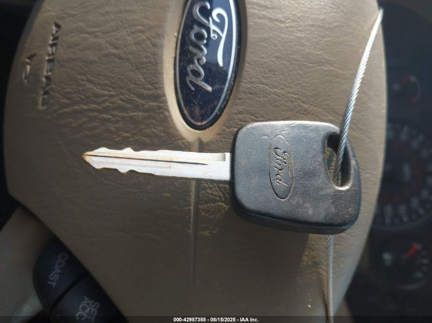 2005 Ford Focus Zx4 VIN: 1FAFP34N95W258850 Lot: 42987358