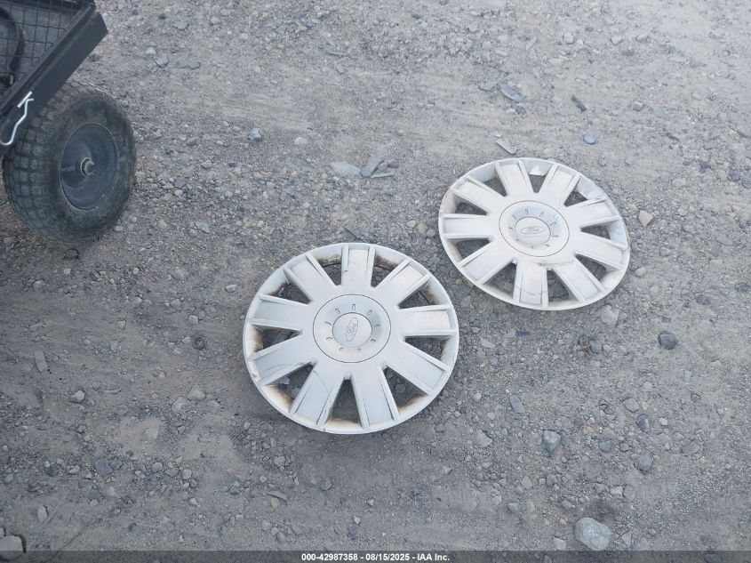 2005 Ford Focus Zx4 VIN: 1FAFP34N95W258850 Lot: 42987358