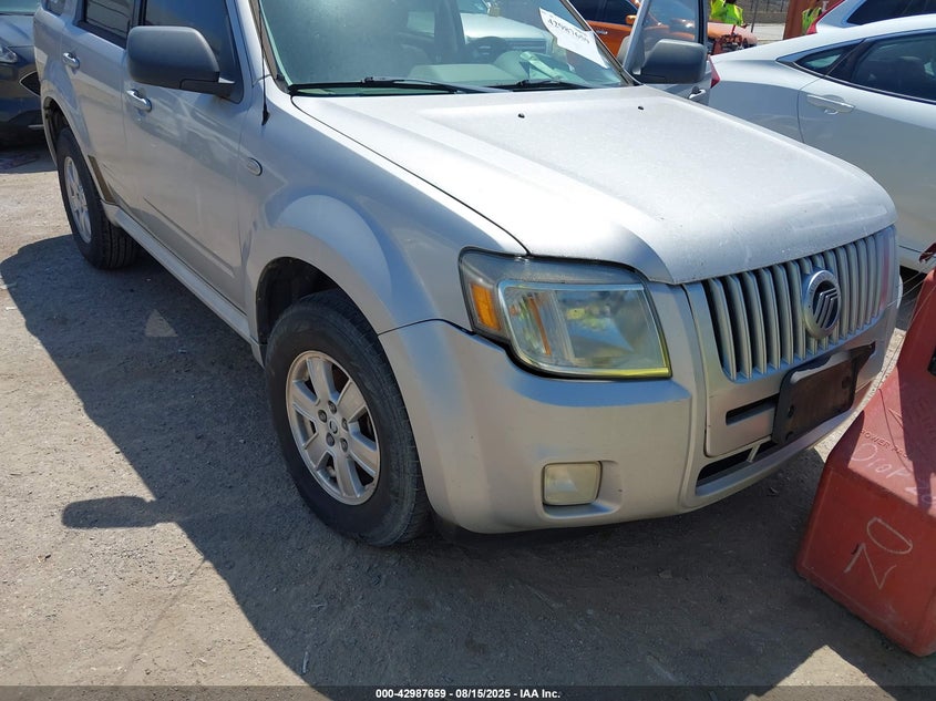 2009 Mercury Mariner I4 VIN: 4M2CU81729KJ19921 Lot: 42987659