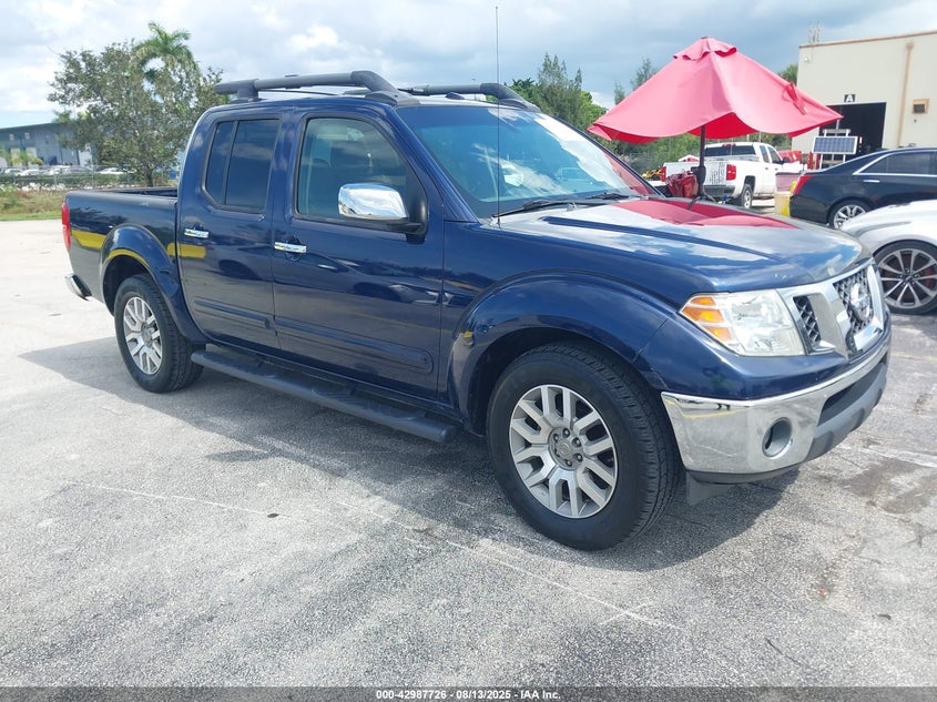 1N6AD07U59C409931 2009 Nissan Frontier Le auction photo 1