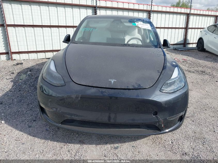 2024 Tesla Model Y Long Range Dual Motor All-Wheel Drive VIN: 7SAYGAEEXRF117904 Lot: 42989358