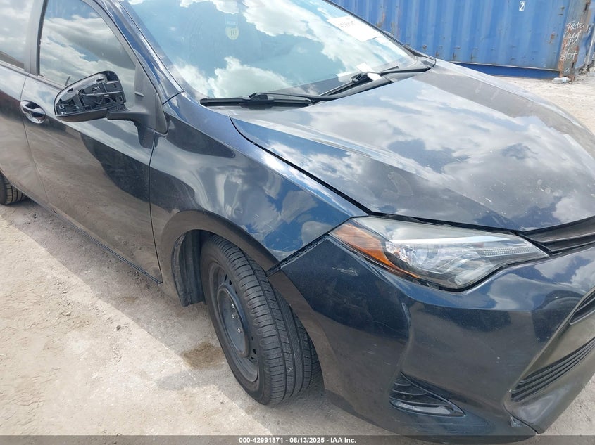 2017 Toyota Corolla Le VIN: 5YFBURHE3HP654591 Lot: 42991871