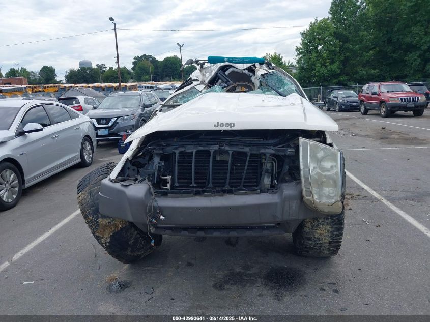2004 Jeep Grand Cherokee Laredo VIN: 1J4GW48S14C317603 Lot: 42993641