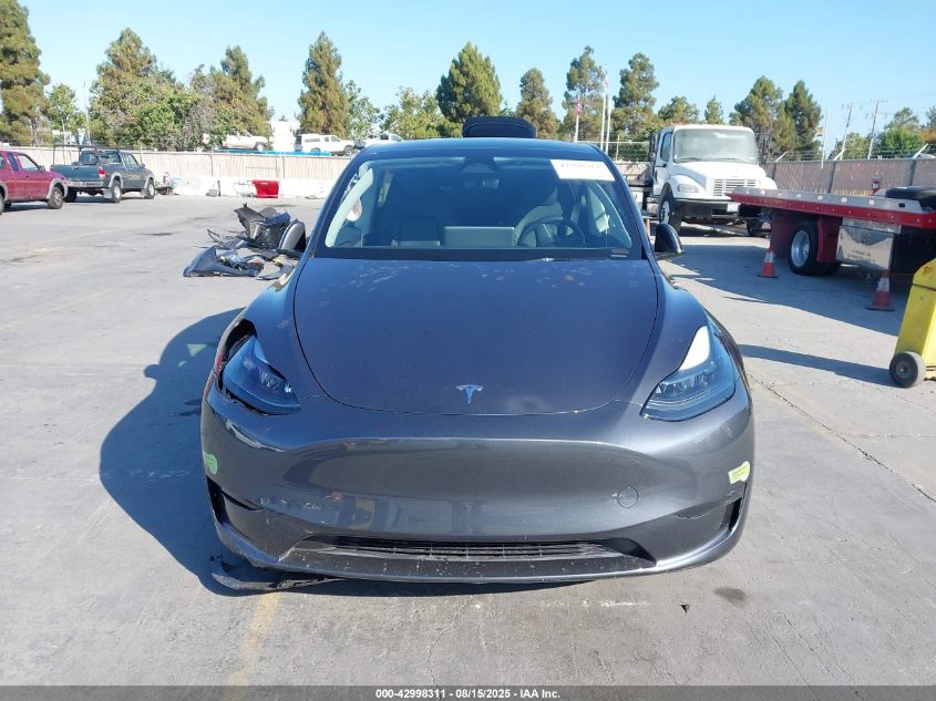 2023 Tesla Model Y VIN: 7SAYGDEE3PF831212 Lot: 42998311