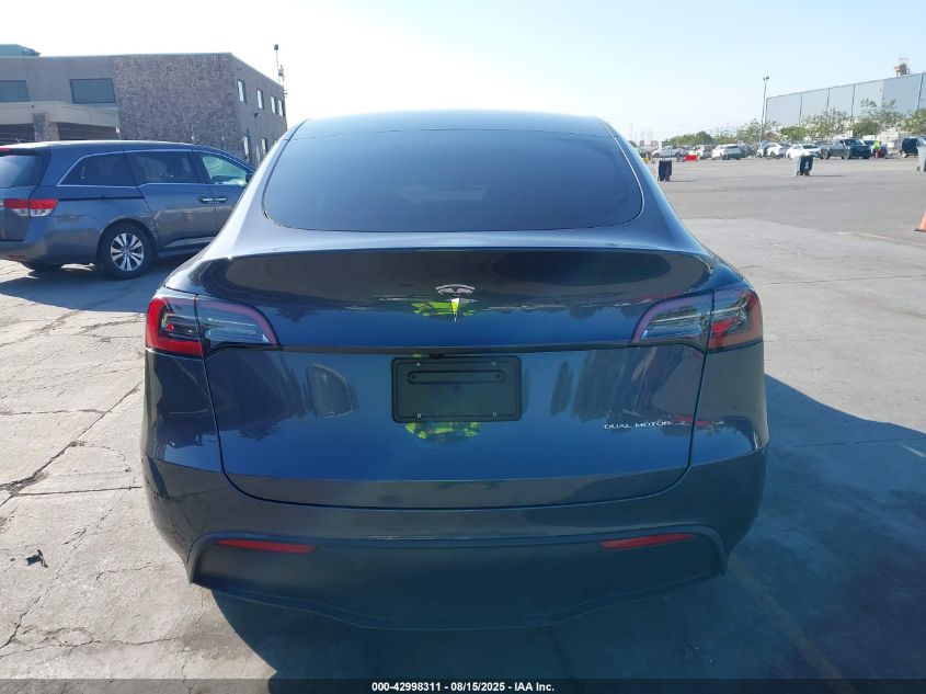2023 Tesla Model Y VIN: 7SAYGDEE3PF831212 Lot: 42998311