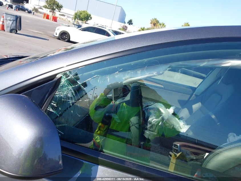 2023 Tesla Model Y VIN: 7SAYGDEE3PF831212 Lot: 42998311