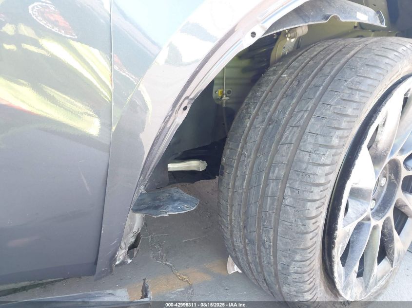 2023 Tesla Model Y VIN: 7SAYGDEE3PF831212 Lot: 42998311