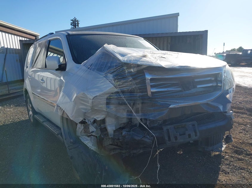 2015 Honda Pilot Touring VIN: 5FNYF3H91FB009452 Lot: 43001582